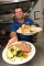 Stacy Hinkle, regional area supervisor for catering at a Pennsylvania camp, shows off a worker's dinner.