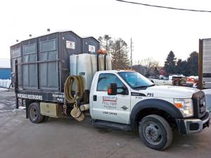 Restroom service trucks with rectangular vacuum tanks serving as the truck bed give Bishop’s Fulltime Portables the ability to carry up to six restrooms, which has provided a big boost in efficiency. (Photos courtesy of Steve Bishop)