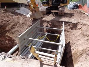 A shoring system is required when digging 5 feet or deeper.