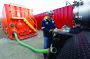 Ryan Starr, head mechanic, performs preventive maintenance on a 2014 International PayStar 130-barrel water truck at the company’s garage in Washington County, Pennsylvania.