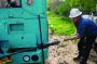 Bullzeye Oilfield Services field engineer Nicholas Henney prepares a drill line on a new truck.
