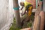 A crew member from T-Rex Hydro Excavation in Houston works on a utility locate using a hydroexcavator. With the slowdown in oil prices in Texas, T-Rex has had to shift its focus to more construction and utilities work.