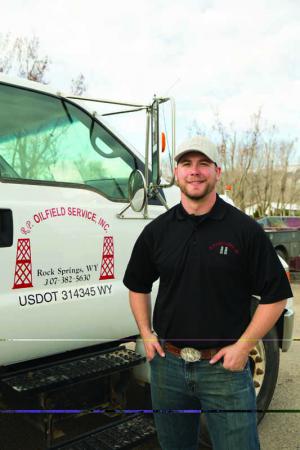 R.P. Oilfield Service general manager Patrick Hartford stands in front of the company’s Ford F-650 auger truck (Highway Manufacturing). Hartford plans to take over the company, located in Rock Springs, Wyoming, later this summer. The company provides several services throughout Wyoming, including auger boring and general construction.