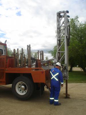 Two anchor trucks owned by Alberta-based Anchor King and outfitted by DB Hydraulics, sit at Anchor Kings yard ready for work. The company owns several anchor trucks, which are used to secure drilling rigs. (Photo courtesy Anchor King)